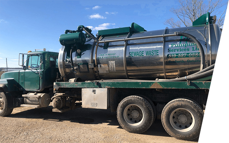 PP Pumping Services Ltd truck green with blue skies in the background